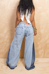 *Light and dark distressed wide leg denim jeans (4/5)